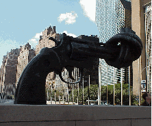 Center right is the statue that you see when you first enter the United Nations.  If all guns were built like this, think how peaceful the world would be!