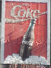 From a distance you probably would walk by it and never notice, (we did for years).  The Coke sign in Times Square moves and the cap comes up and down on that old Coke bottle.