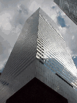 Top right is a picture taken in front of the Citicorp Building looking up.  You have to hope the architects knew what they were doing!  The edge of the building looks as if it's missing a leg and  could topple over on you.