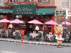 Top left is a picture of Da Nico on Mulberry Street which is lined with wonderful Italian restaurants and stores. As you stroll along you'll notice the vivid colors of the decors and extraordinary measures the restaurants go hoping to tempt you inside.  