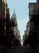 Center right is the Empire State Building at dawn as seen on Fifth Avenue in Greenwich Village. 