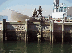 The picture bottom right is the Merchant Marines Memorial at Battery Park.  It's an easy one to miss, but well worth the effort.