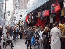 Bottom right picture is the corner of Broadway and Canal.  Here' s where you'll find perfume and handbags at rock bottom prices.  Remember a lot of the merchandise is knock-offs but it's very believable.