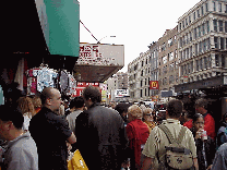 Center right you see the masses on the sidewalk of Canal Street.  It's like this all day everyday.