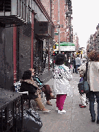 Center right picture you see a few neighborhood ladies chatting as they watch traffic on Mulberry Street.  Many of the Italian families have moved out of the city to the suburbs, however, you still see a very strong Italian influence.