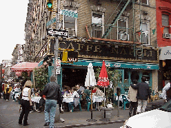 Center right picture you see Caf Napoli in Little Italy.  Most of the restaurants in Little Italy have dining rooms as well as sidewalk dining in nice weather.