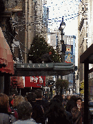 Top right picture is Macy's Department Store as the workers put up Christmas lights.