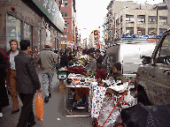 You don't have to have a lot of money to have a good time in Chinatown.  Every street vendor understands bargaining so you can really stretch that 'dollar', which is the most popular word in any language!