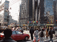 Center right picture you see Herald Square and shoppers going to one of the very few malls we have in NYC.