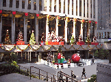 Center right picture you see Christmas decorations on Sixth Avenue in midtown.