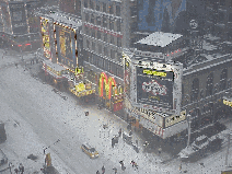 Top right picture you see a corner of Broadway covered in a blanket of snow.