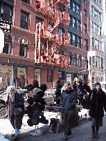 Center right picture you see purse sales on the sidewalks of Soho.