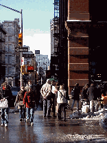 Center right is a photo of a corner of Mercer Street in Soho as shoppers look at handbags.