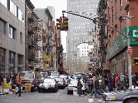 Bottom right picture you see Mulberry Street in Chinatown. This street is packed with great Chinese stores selling food, dishes, spices and more.  If you walk in the opposite direction on Mulberry Street you'll be in Little Italy.