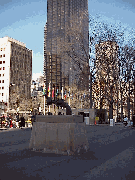 Top left photo you see a statue of a gun on the lawns of the UN Plaza with the new Trump World Tower in the distance.