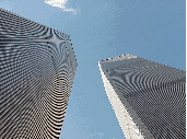 Center right picture you see the World Trade Center as seen from standing directly below the World Trade Towers.