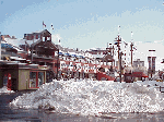 Top left photo you see the piers of South Street Seaport buried in snow!