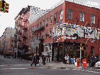 Bottom right picture you see a colorful building on the corner of West Broadway in SoHo.