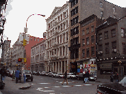 Bottom right you see West Broadway in Soho.  You will find the streets lined with trendy restaurants and well known designer stores.  If you explore the area you'll find many art galleries upstairs in these beautiful old buildings.