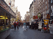 Top left picture you see people shopping at a street fair on University Place in the Village.  The food at these street fairs ranges from hot dogs to French crepes.