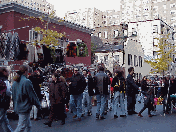 Center right you see a street fair at University Place in Greenwich Village.