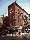 Top right photo you see a pretty building in Little Italy as snow melts on the streets.