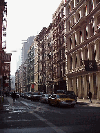 Top right you see some of the beautiful cast iron buildings that are distinctive of Soho.  Many artists live in loft spaces in old renovated warehouses. It's not easy to get one of these expensive apartments. 