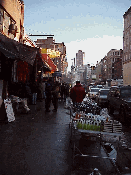 Top left photo you see vendors on the sidewalk of Canal Street.