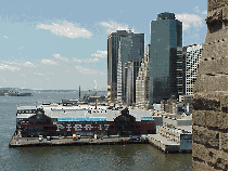 Top left picture you see a view of the historic ships that make up the South Street Seaport Museum. Top right picture was taken from the Brooklyn Bridge looking down on the piers of South Street Seaport.