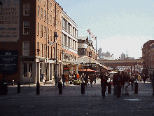 Bottom right picture you see a distant look at South Street Seaport looking toward the piers.  This area of cobblestones streets is lined with shops and restaurants.