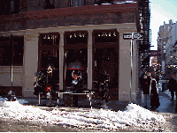 Center right photo you see a vendor selling hats on a snowy day in Soho. Sidewalk sales are a daily part of city life.