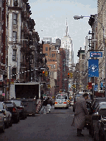 Top left picture you see Mulberry Street during lunch hour.  In the far distance you see the Empire State Building.