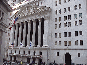 Wall Street in New York City is less than a mile long but it has a reputation that spans the world.  Here is where you see the men in suits nervously smoking their cigarettes on the sidewalk during breaks from the trading floors.