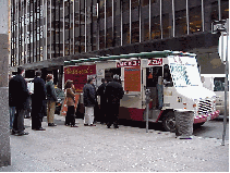 Bottom right you see downtown business people lined up to by a slice of pizza from a lunch van. We don't know why since there are tons of restaurants and pizza parlors everywhere. We confess we didn't try 'a slice' from the pizza van.