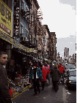 Center right picture you see another shot of Canal Street.  All of the streets are lined with stores selling everything in the world that you can possibly imagine and then some.