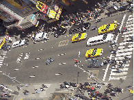 Center right picture you see traffic is moving along at a steady pace on Broadway.  You can't look up here or you'll get slammed, horns will blow, fingers will fly, and you'll be blasted with four letter words that are clearly identifiable.