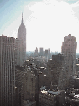 Center right picture you see the Empire State Building in the sunshine as seen from the windows of the New York Hilton on 42nd Street.  The Hilton Hotel has great views!