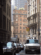 Top right picture you see how narrow the streets are downtown. The buildings are very tall and block the sunshine during many hours of the day.  You see in the distance that someone is growing trees on the rooftop.  New Yorkers love their rooftops.