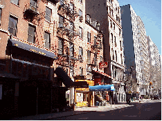 Center right picture is a long shot of Bleecker Street where famous bars and nightclubs like Terra Blues and the Bitter End line the street.