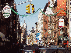 Bottom right picture you see the decorations on Mulberry Street and the Empire State Building can be seen in the distance. 