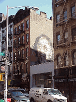 Top left photo is a billboard on Mott Street near Little Italy.