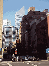 Top left picture you see the Apollo Theatre in Harlem.  President Bill Clinton will go to work on 125th Street close to this famous sight. Top right picture you see First Avenue with the Citicorp Building in the distance. 