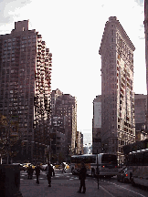 Center right picture you see the Flatiron Building in New York's Silicon Alley. When economic times were better (remember the good ole days about four months ago?) a lot more dot com workers showed up here.