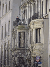 Top left photo you see a man on his balcony as he talks on the phone at an Upper East Side Mansion.