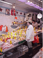 Top left photo you see a fish market in Chinatown.  The fish in these markets are so fresh they are usually wiggling around.