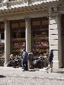 Center right is a picture of New Yorker's enjoying a treat at the Gourmet Garage in Soho.