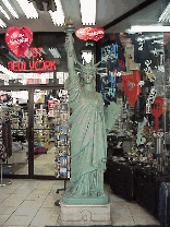 Another fact about success is that once you make it...everyone imitates!  Top left photo you see the Statue of Liberty as seen in a souvenir shop on 8th Avenue in Hell's Kitchen.