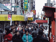 Center right you see a constant in NYC - busy people.  Picture of Centre Street and Canal Street in Chinatown.