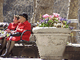 Top left photo you see a couple of ladies that are prettier than the flowers as they enjoy a warm spring day in Bryant Park.