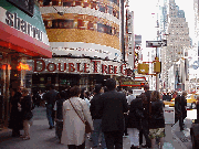 Top left picture you see tourists passing the Doubletree Suites Hotel on Broadway.  This is right across the street from the TDF (Theater Development Fund) Ticket Stand.